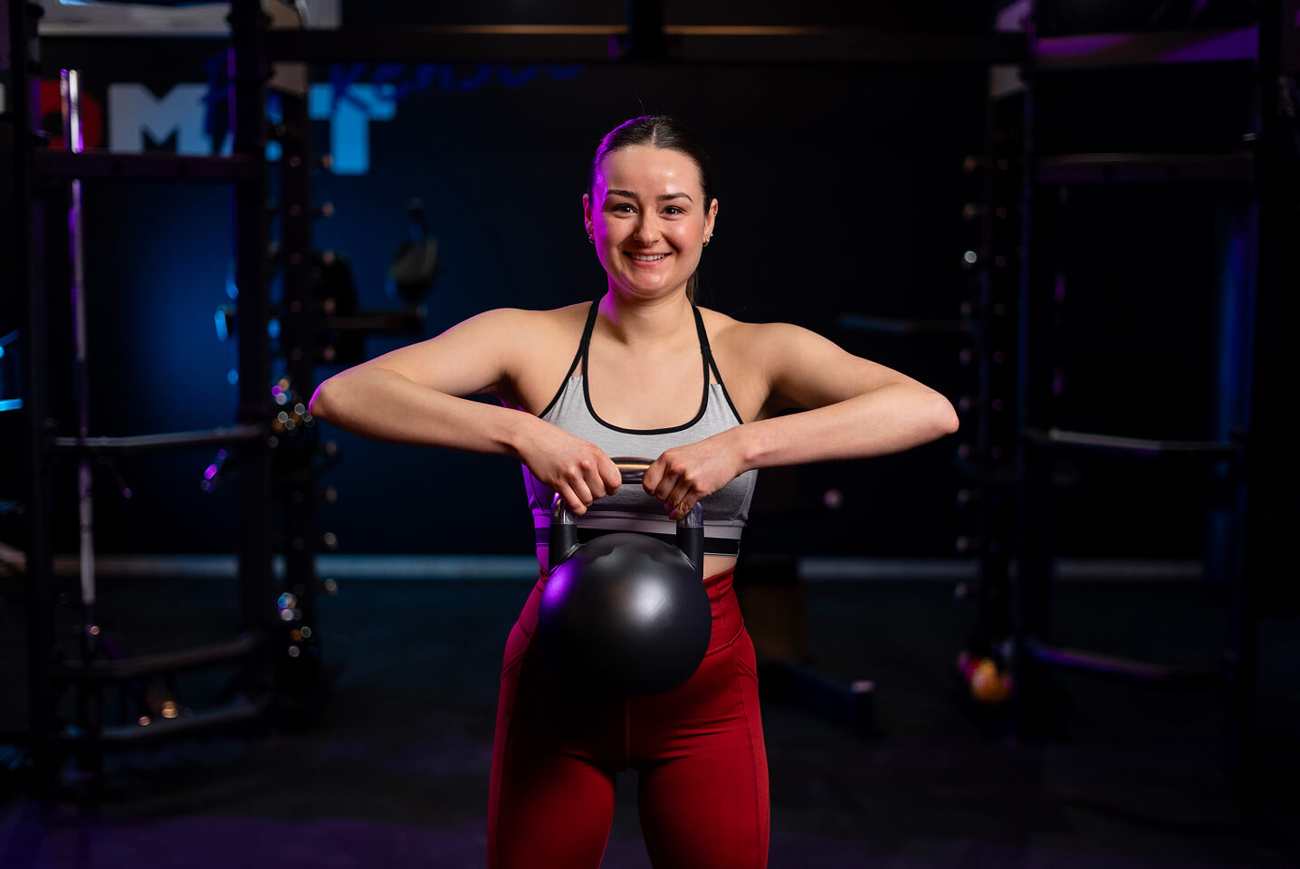 woman-lifting-medicine-ball